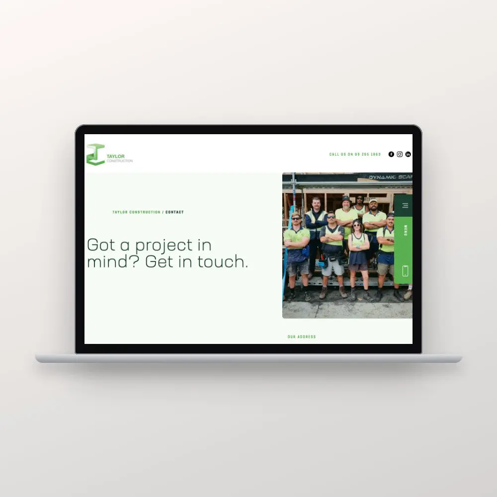 Taylor Construction website on a laptop